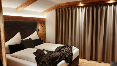 lech suite - Schlafzimmer mit Boxspringbett