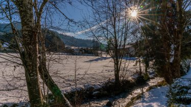 Sonnentalhof Bach Sonne Blick Winter Feratel