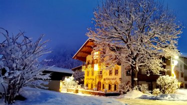 Aussenansicht Fischerwirt Winterlandschaft