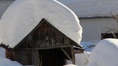 Sägewerk unter Schneelast