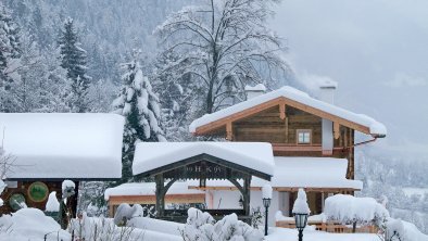 Die Hütte Ramsau - Hütte und Garten im Winter