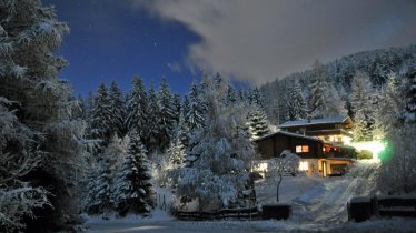 Winteransicht Abend Haus Schwaninger