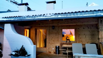 Chalet Alpenhoamatl_Terrasse_Aussicht_Bergwinter (