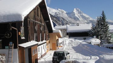 Blick zur Eisenspitze und zum Bauernhof östlich Bergheim