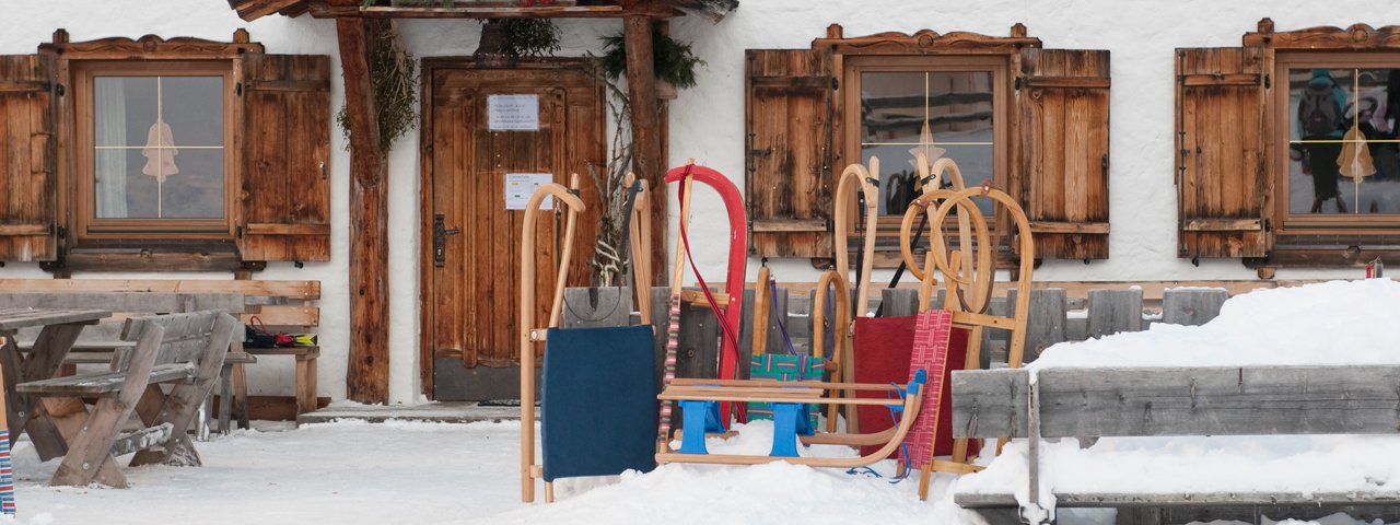 Rodeln in Tirol, © Tirol Werbung / Martina Wiedenhofer