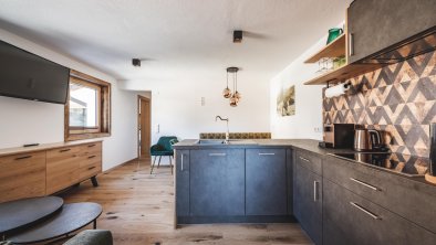 Wohnraum + Küche Apartment Eiche